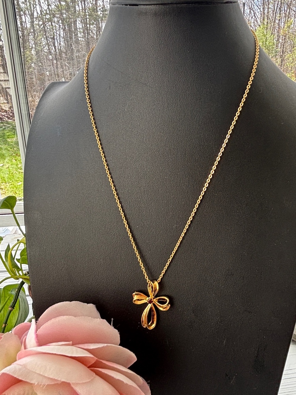 Vintage Avon Gold Tone Ribbon Style Cross with Dark Red Stone